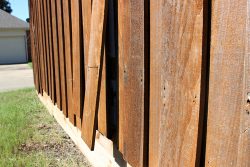 Fence,Needs,Repair,And,Maintenance,,Fence,That,Is,Showing,Wear