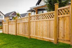 Nice,Wooden,Fence,Around,House.,Wooden,Fence,With,Green,Lawn.